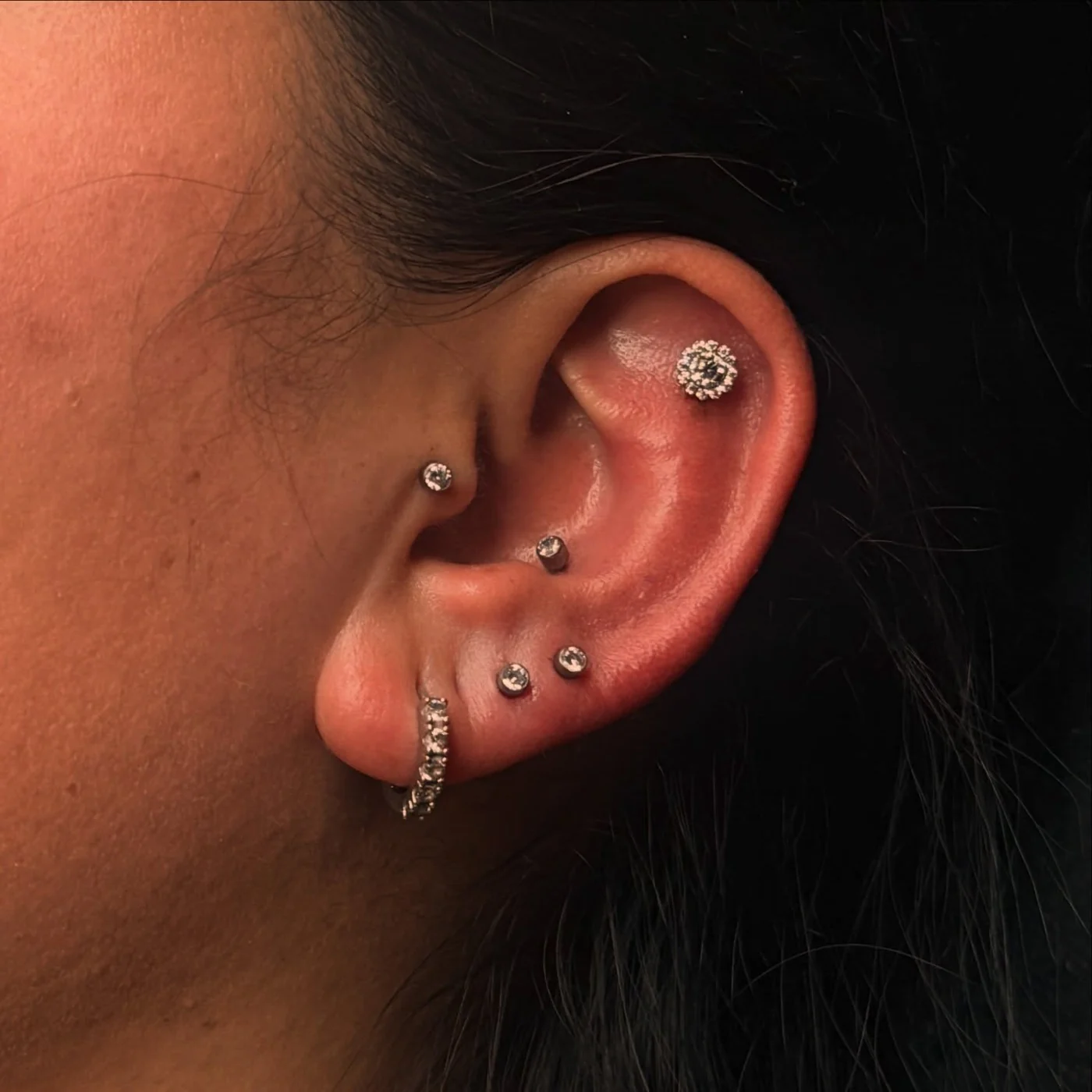 Curated ear jewelry and piercings by Karol